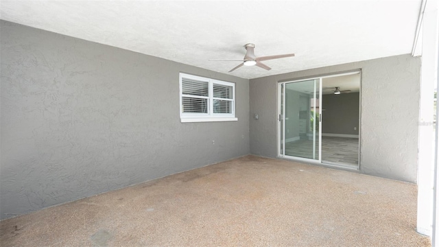 8522 Inwood Dr, Hudson, FL 34667 - spare room with ceiling fan, a textured wall, and carpet flooring