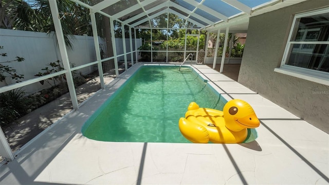 8522 Inwood Dr, Hudson, FL 34667 - view of pool with a patio, a fenced backyard, glass enclosure, and a fenced in pool