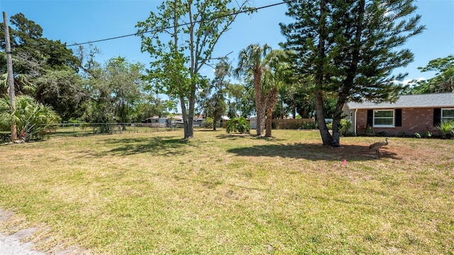 8522 Inwood Dr, Hudson, FL 34667 - view of yard featuring fence