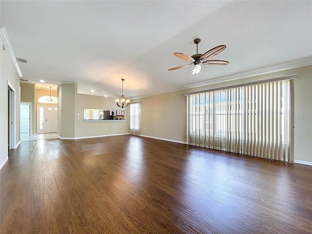 unfurnished living room with a chandelier, ornamental molding, dark wood-type flooring, ceiling fan, and baseboards