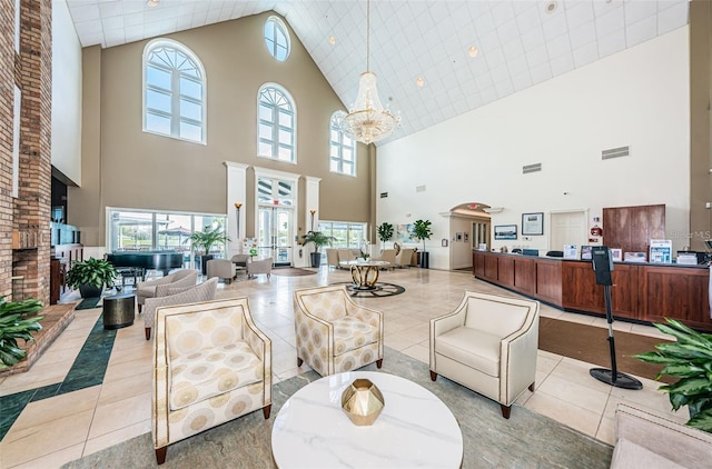 community lobby featuring high vaulted ceiling