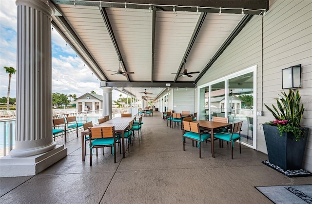 view of patio / terrace with outdoor dining area and ceiling fan