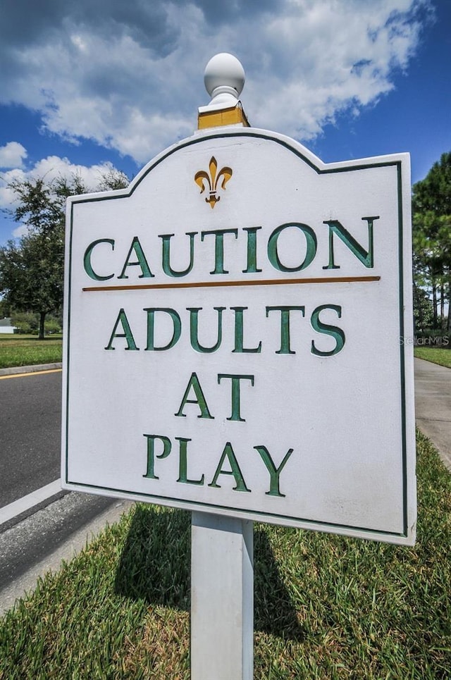 view of community sign