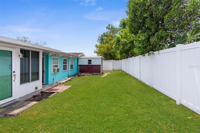 view of yard featuring a fenced backyard and cooling unit