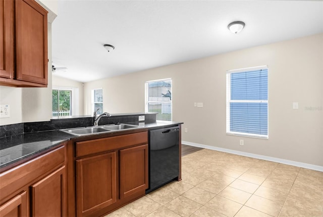3410 Thistledown Ln, Land O Lakes, FL 34638 - kitchen with dishwasher, light tile patterned floors, brown cabinets, and a sink