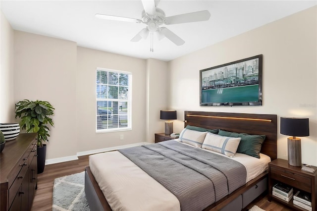 3410 Thistledown Ln, Land O Lakes, FL 34638 - bedroom featuring ceiling fan, baseboards, and wood finished floors