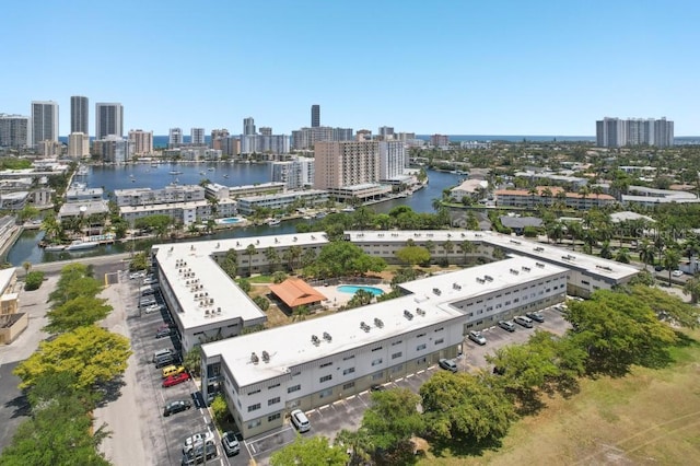 aerial view with a view of city and a water view