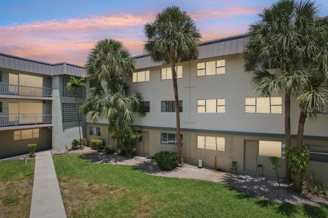 view of property at dusk