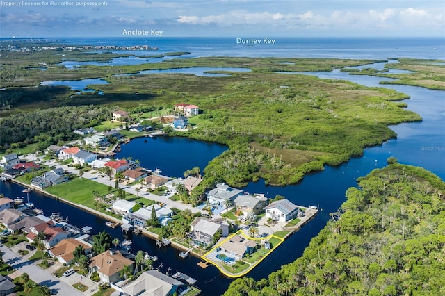 aerial view featuring a residential view and a water view
