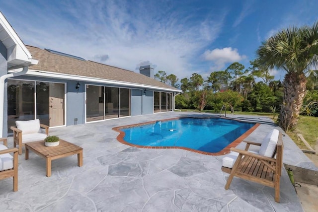 outdoor pool featuring a patio