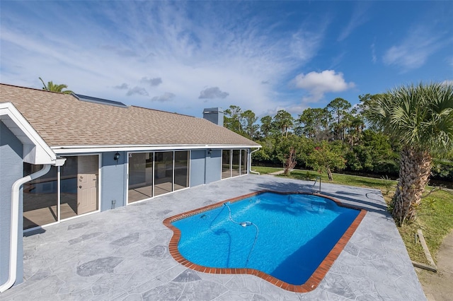 outdoor pool featuring a patio