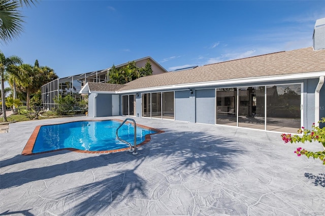 pool with a patio area