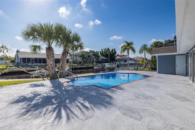 outdoor pool featuring a patio