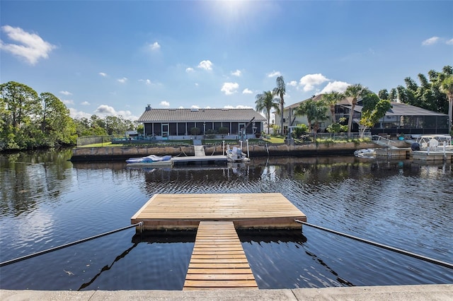 dock area featuring a water view