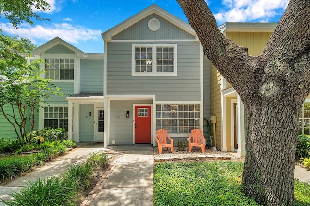 traditional home featuring covered porch