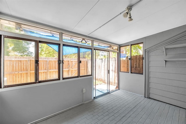 view of unfurnished sunroom