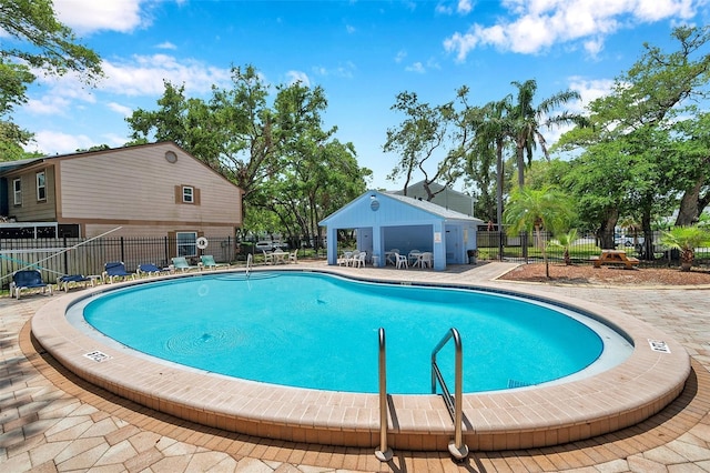 community pool with fence