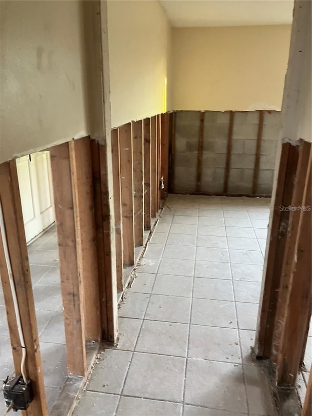 hallway with light tile patterned flooring