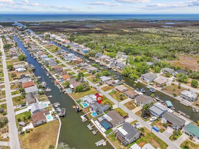 aerial view with a water view and a residential view