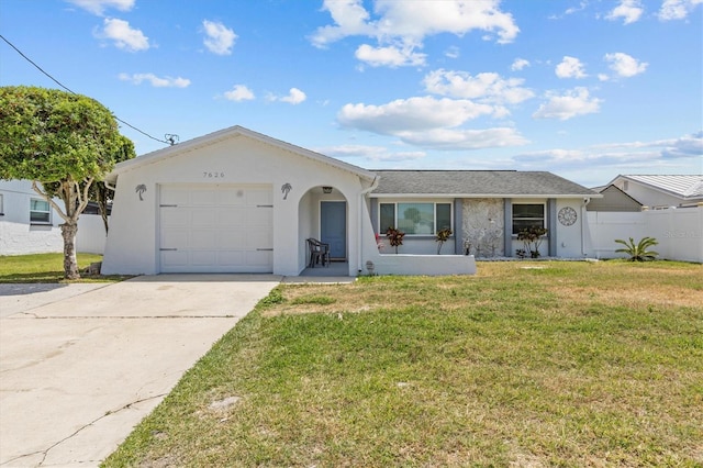 ranch-style house with fence, a front yard, stucco siding, concrete driveway, and an attached garage