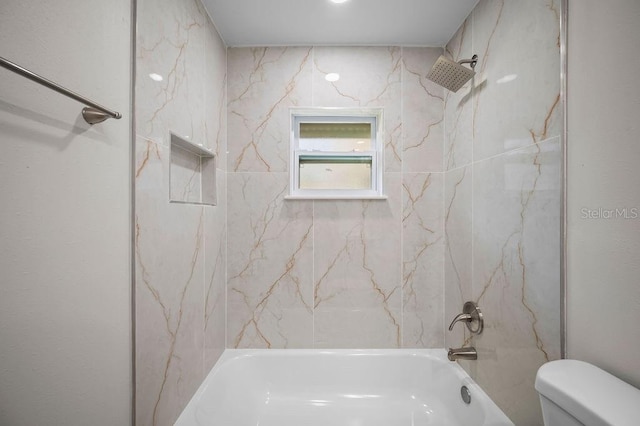 full bathroom featuring toilet and bathing tub / shower combination