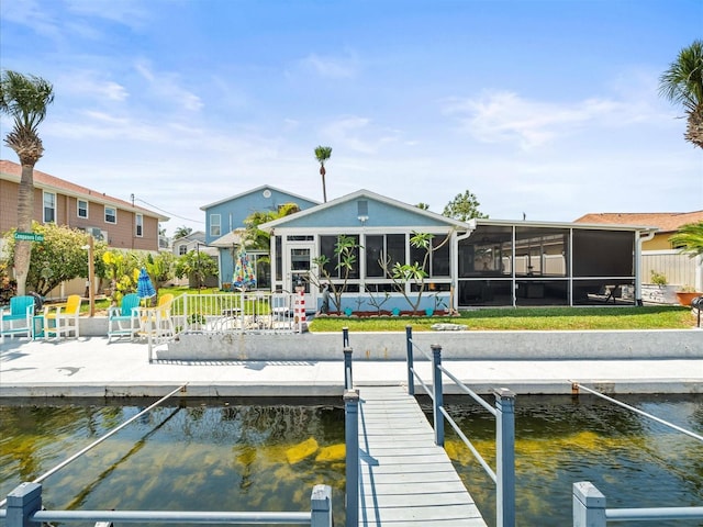 dock area with a water view