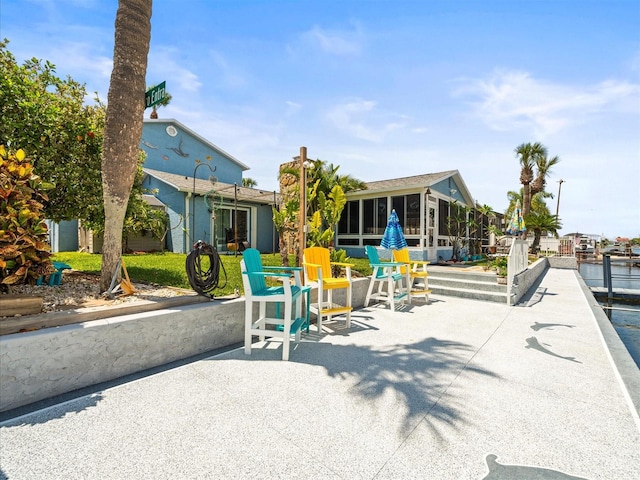 view of community with a patio area