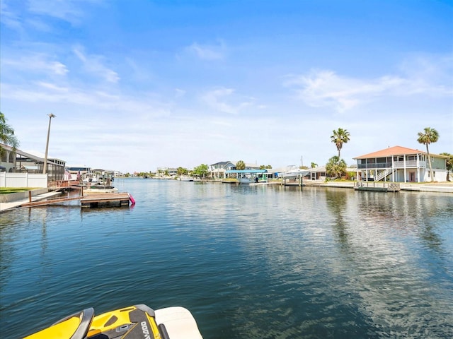 property view of water with a dock