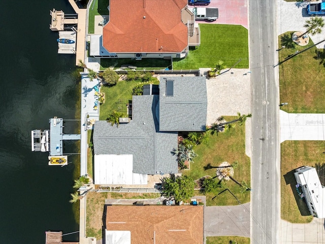 drone / aerial view featuring a water view