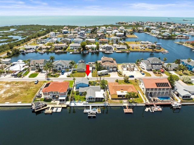 aerial view with a water view and a residential view