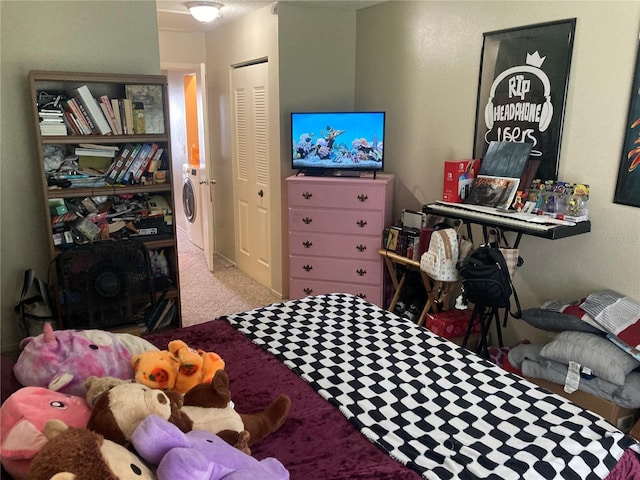 2850 Westmoreland Ct, New Port Richey, FL 34655 - carpeted bedroom with washer / dryer