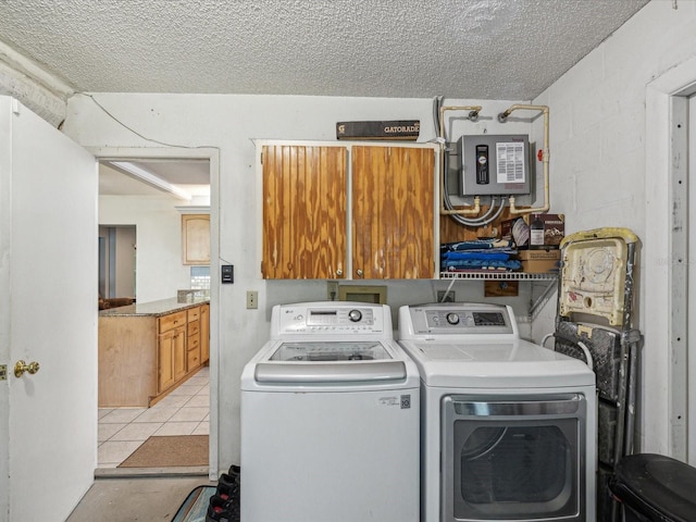 11512 Yellow Birch Ct, New Port Richey, FL 34654 - laundry area with independent washer and dryer, concrete block wall, and a textured ceiling