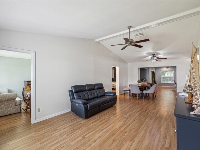 11512 Yellow Birch Ct, New Port Richey, FL 34654 - living room featuring ceiling fan, light wood-style floors, and baseboards