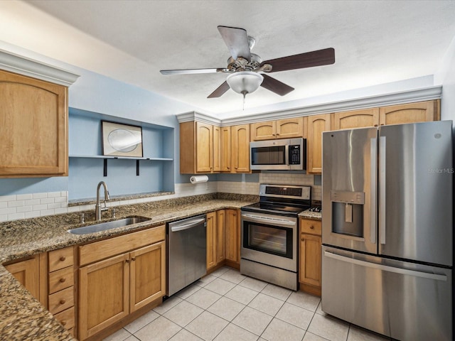 11512 Yellow Birch Ct, New Port Richey, FL 34654 - kitchen with stainless steel appliances, a sink, open shelves, tasteful backsplash, and dark stone counters