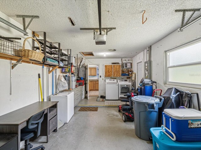 11512 Yellow Birch Ct, New Port Richey, FL 34654 - garage with washing machine and dryer, a garage door opener, electric panel, and fridge