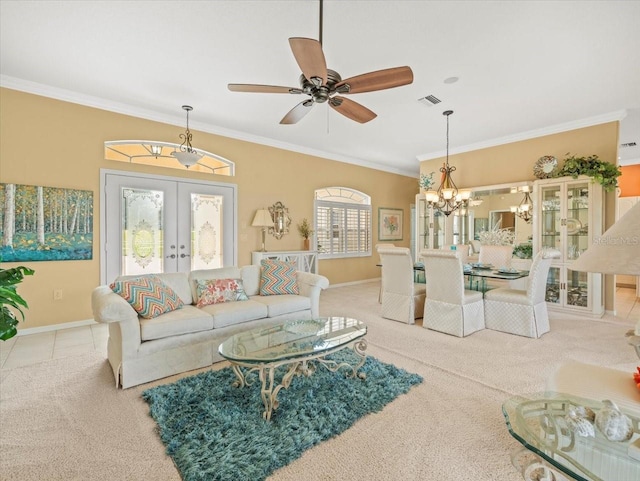 9216 Tarleton Cir, Weeki Wachee, FL 34613 - tiled living area featuring crown molding, visible vents, french doors, and baseboards