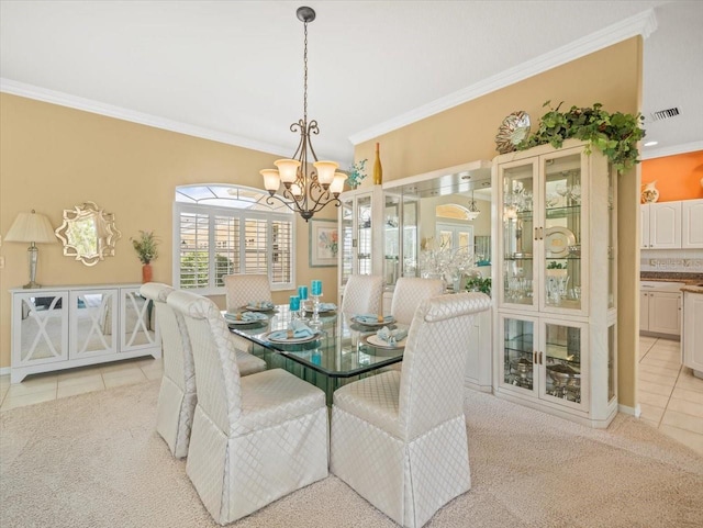9216 Tarleton Cir, Weeki Wachee, FL 34613 - dining area with light colored carpet, crown molding, light tile patterned floors, and a chandelier