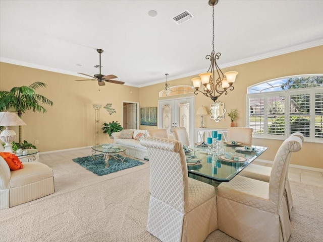 9216 Tarleton Cir, Weeki Wachee, FL 34613 - dining space with carpet flooring, visible vents, baseboards, and ornamental molding