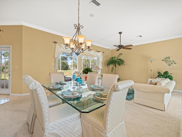 9216 Tarleton Cir, Weeki Wachee, FL 34613 - dining space featuring baseboards, a wealth of natural light, light carpet, and visible vents