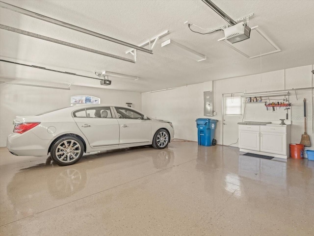 9216 Tarleton Cir, Weeki Wachee, FL 34613 - garage with electric panel and a garage door opener