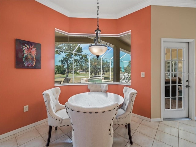 9216 Tarleton Cir, Weeki Wachee, FL 34613 - dining space with light tile patterned floors, baseboards, and ornamental molding