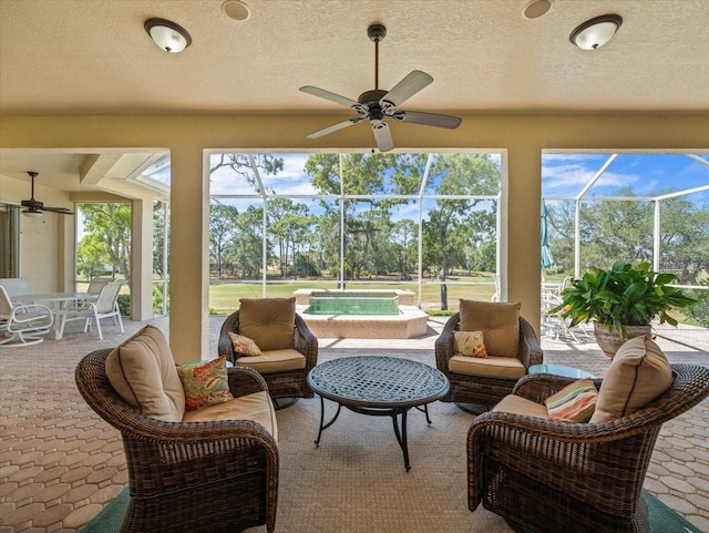 9216 Tarleton Cir, Weeki Wachee, FL 34613 - sunroom / solarium featuring ceiling fan and a healthy amount of sunlight