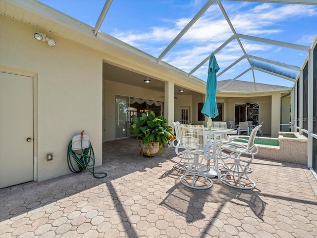 9216 Tarleton Cir, Weeki Wachee, FL 34613 - view of patio / terrace with outdoor dining area, a swimming pool, ceiling fan, and glass enclosure