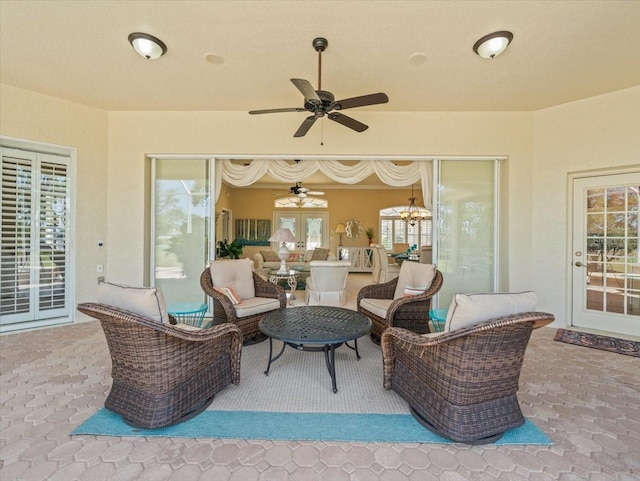 9216 Tarleton Cir, Weeki Wachee, FL 34613 - view of patio / terrace featuring french doors, ceiling fan, and outdoor lounge area