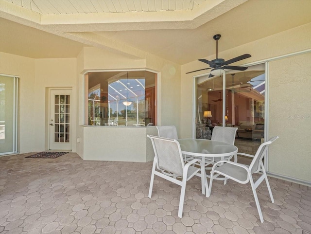 9216 Tarleton Cir, Weeki Wachee, FL 34613 - view of patio / terrace featuring a ceiling fan and outdoor dining area