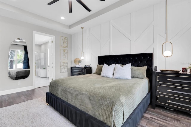 4188 Barbour Trl, Odessa, FL 33556 - bedroom with wood finished floors, recessed lighting, ensuite bath, baseboards, and a ceiling fan