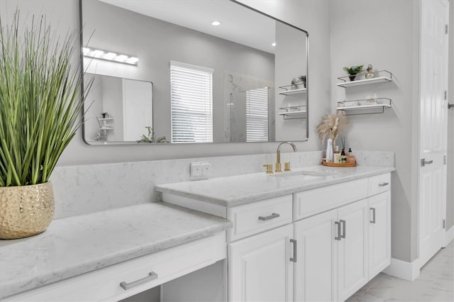 4188 Barbour Trl, Odessa, FL 33556 - full bath featuring marble look tile flooring and vanity