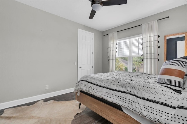 4188 Barbour Trl, Odessa, FL 33556 - bedroom featuring baseboards, wood finished floors, and a ceiling fan