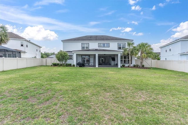 4188 Barbour Trl, Odessa, FL 33556 - back of property with a sunroom and stucco siding