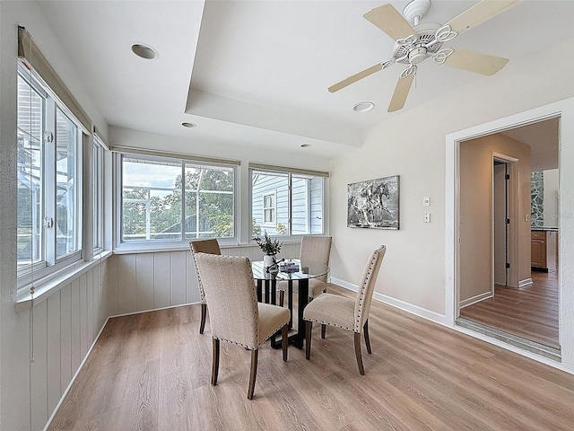 dining area featuring a ceiling fan, a wealth of natural light, light wood finished floors, and recessed lighting